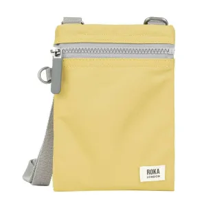 Roka Chelsea Sustainable Nylon Pocket Sling Bag - Bamboo Yellow