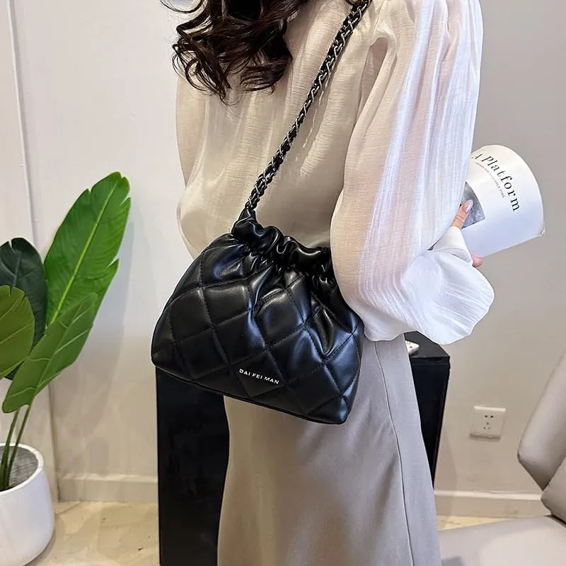 Women's minimalist diamond patterned drawstring one shoulder bucket bag